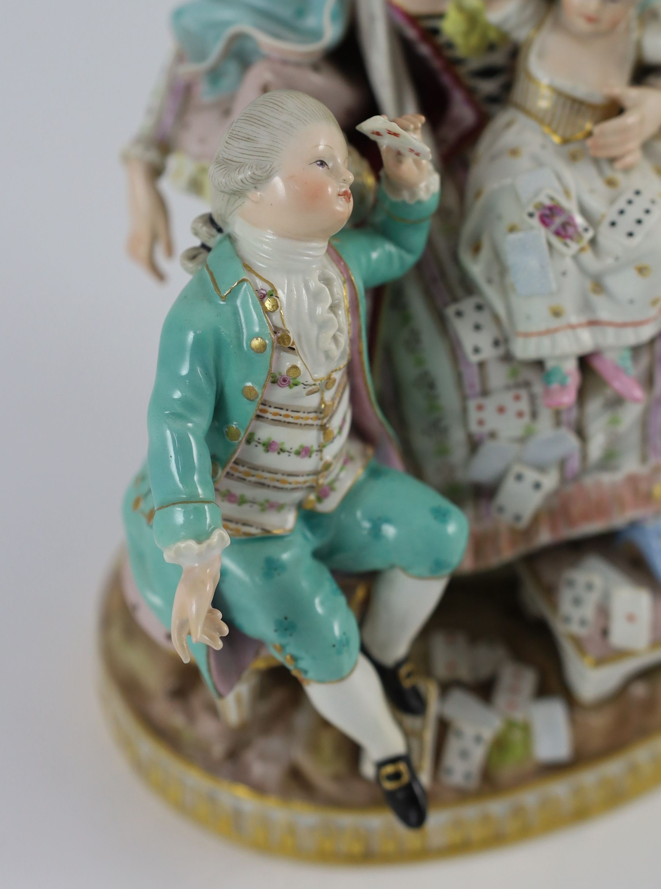 A Meissen group of the good mother, 19th century, after a model by Michel Victor Acier, 22 cm high